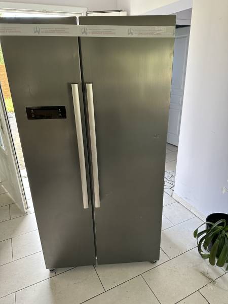 Emballage d’un frigo américain sous couverture à SAINT AUBIN MÉDOC en gironde 