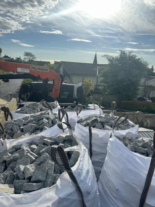 Évacuation de terre plus livraison de   pavé