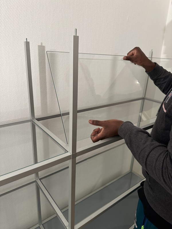 REMONTAGE D'UNE BIBLIOTHEQUE COMPLEXE PAR ML TRANSPORT ET DEMENAGEMENT