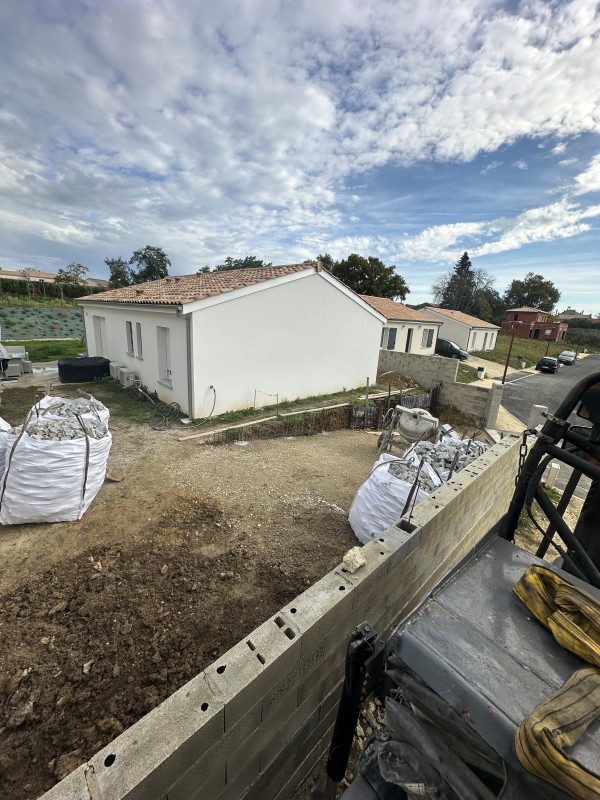 Évacuation de terre plus livraison de   pavé